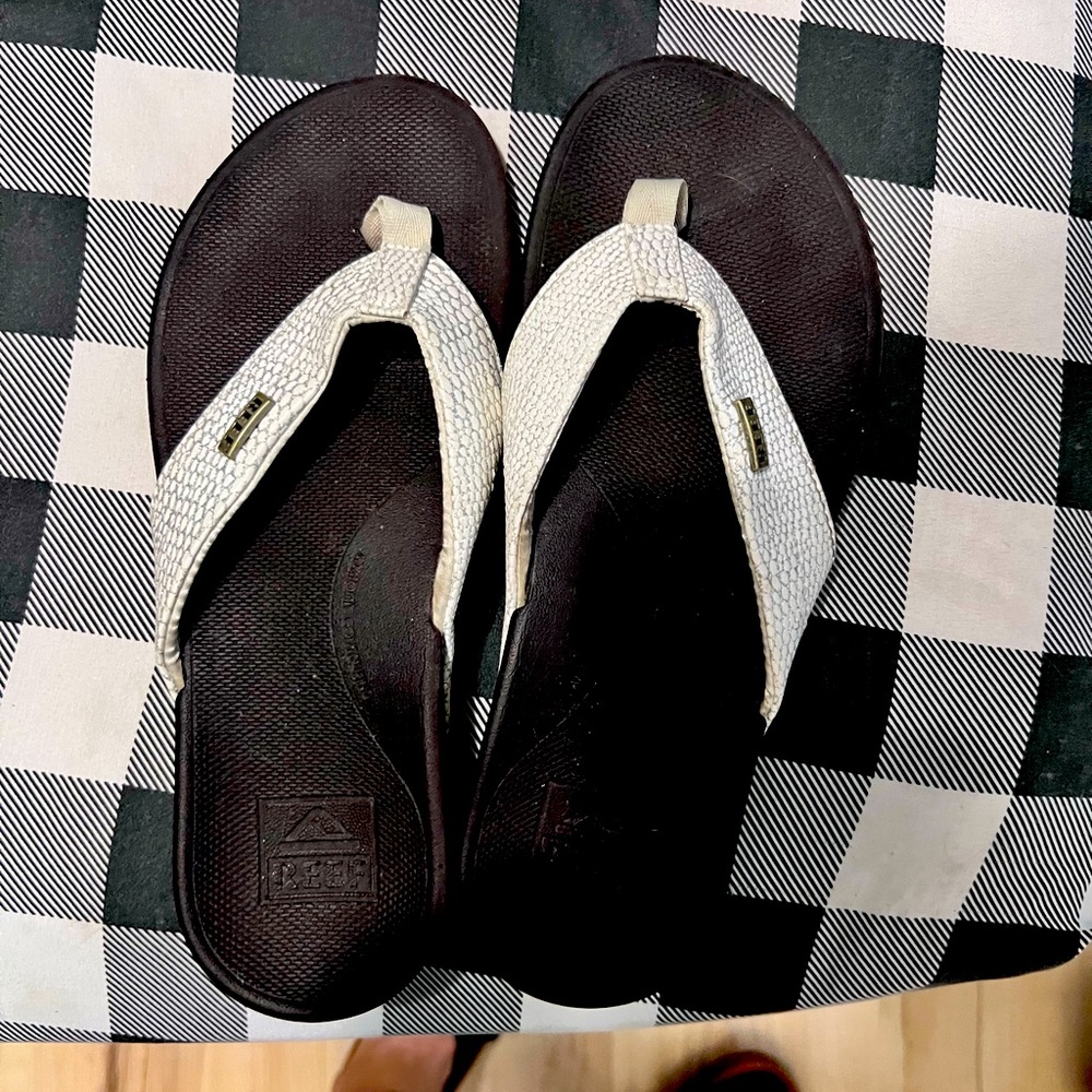 White and Brown Flip Flops